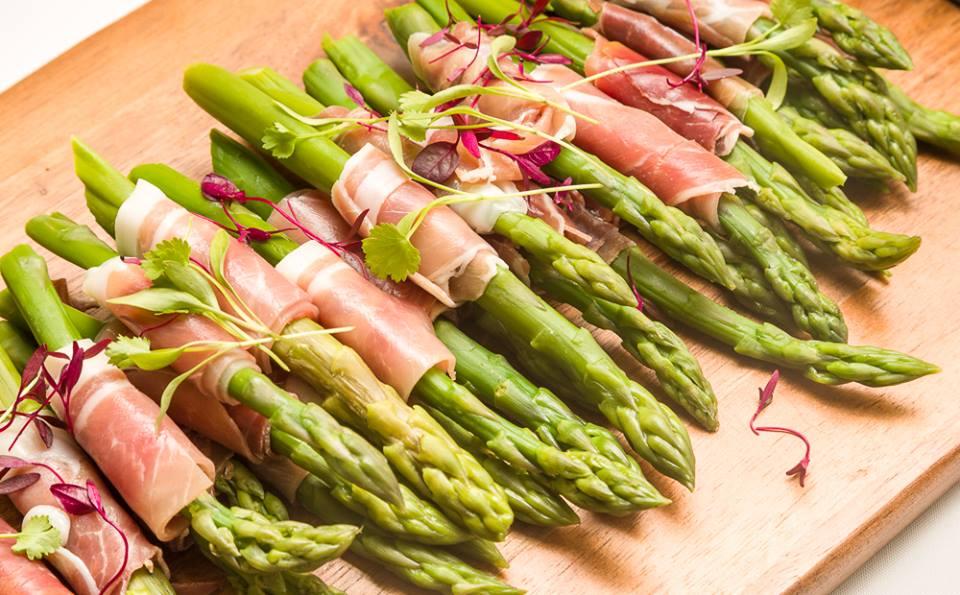 Asparagus wrapped parma ham at catering event Campbell & Rowley Asparagus wrapped parma ham at catering event Campbell & Rowley